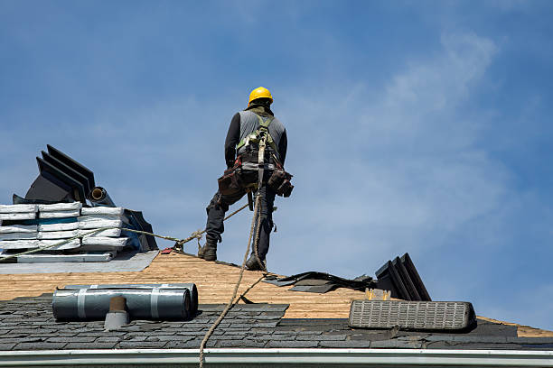 Professional Roof Repair technician working in Memphis, NY